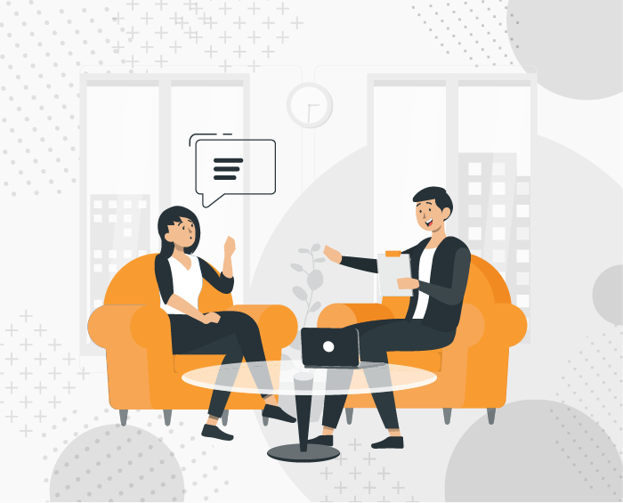 Two professionals in a strategy consultation — illustrating how open communication helps businesses grow